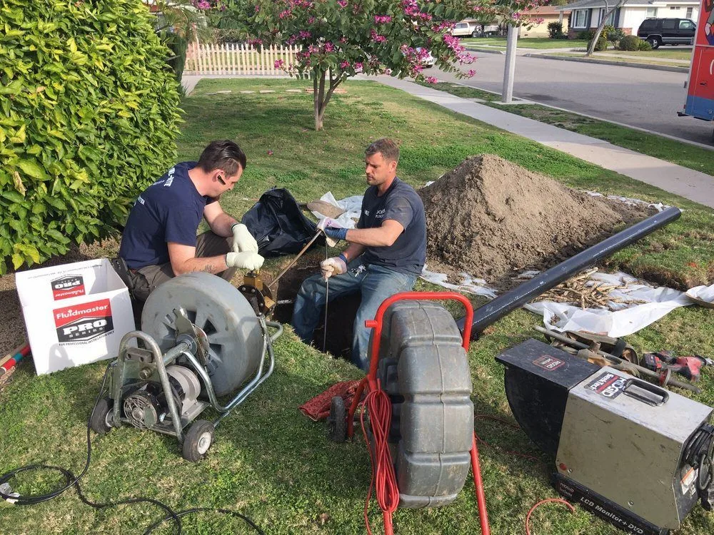 Done-Rite Plumbing crew on a sewer line job